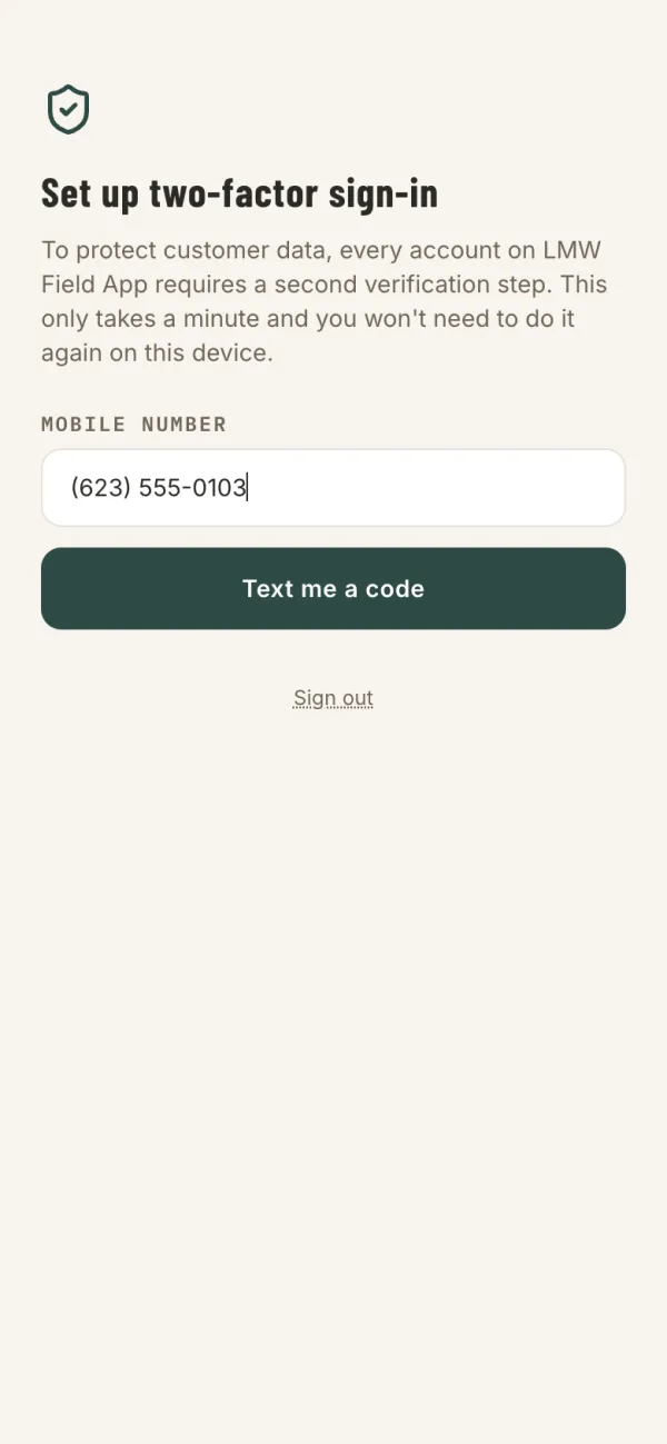The two-factor setup screen asking for a mobile number, with a Text me a code button